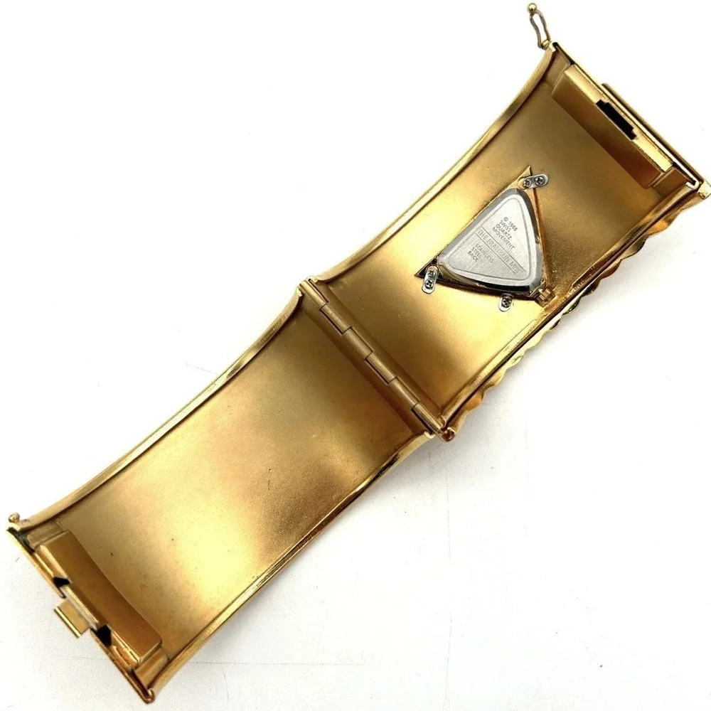 Vintage 80s The Franklin Mint Women's Gold Tone Ribbed Cuff Bracelet Watch 1988